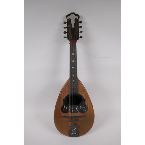 148 - An Italian mandolin by Gennaro Maylioni, Napoli, and a travel case, mandolin 60cm long