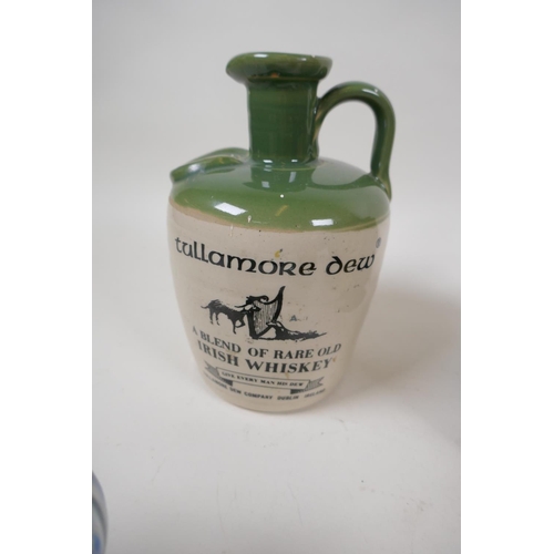 172 - A stoneware 'Tullamore Dew' Old Irish Whiskey flagon, 18cm high, a studio pottery teapot, a Sylvac t... 