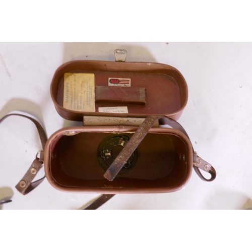 177 - A vintage surveyors' folding measure by Holbro, 111cm long collapsed and a leather cased Hilger &... 