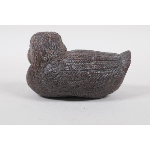 178 - A Japanese carved wood okimono duckling, signed in a cartouche to base, 15cm high