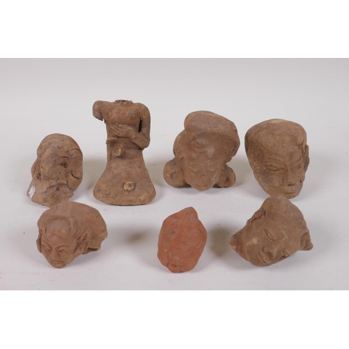 179 - A quantity of ancient Indian terracotta head busts, largest 10cm