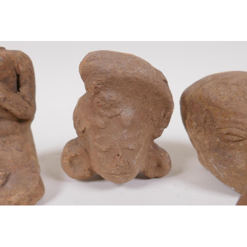 179 - A quantity of ancient Indian terracotta head busts, largest 10cm