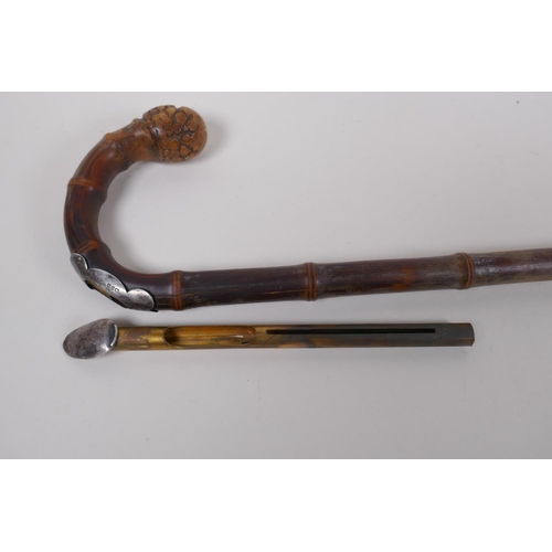 24 - A C19th bamboo walking stick with hallmarked silver mount (Birmingham, 1899) and concealed brass eje... 