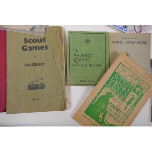 243 - A quantity of ephemera including stamps, first day covers, post cards, scout manuals etc