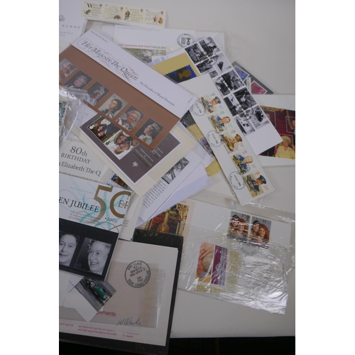 243 - A quantity of ephemera including stamps, first day covers, post cards, scout manuals etc