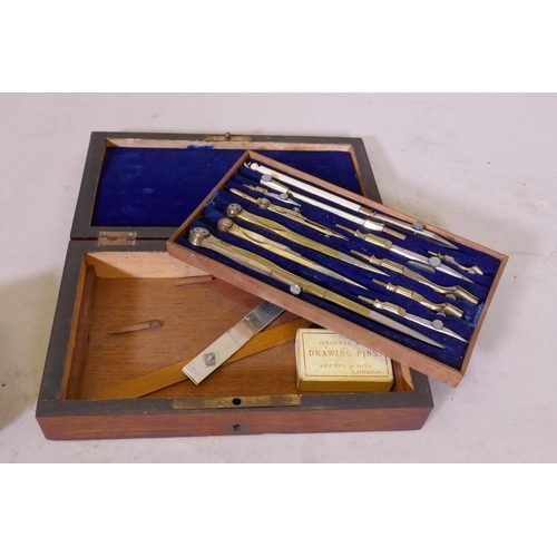 244 - A Victorian rosewood cased set of compasses and draughtsman's instruments, 21cm x 12cm x 14cm