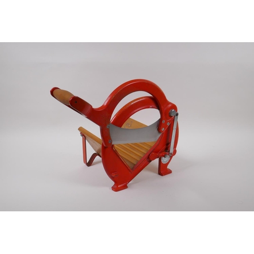 26 - A Danish 1970s cast metal Raadvad bread slicer, 24cm high