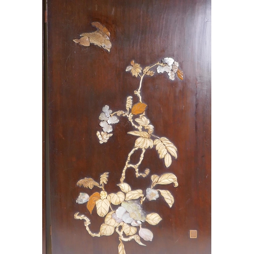 29 - Two Japanese hardwood panels, inset with mother of pearl and carved bone decoration, both signed, an... 