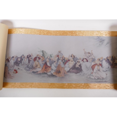 38 - A Chinese printed watercolour scroll depicting an extensive scene with many seated Lohan in conversa... 