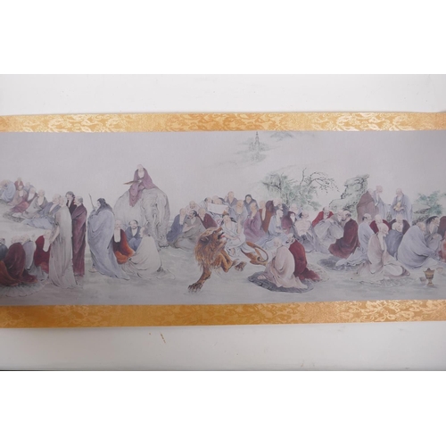 38 - A Chinese printed watercolour scroll depicting an extensive scene with many seated Lohan in conversa... 