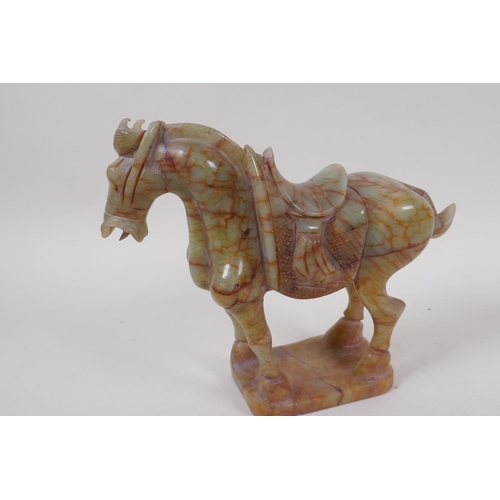 42 - A Chinese carved hardstone figure of a horse, 18cm high