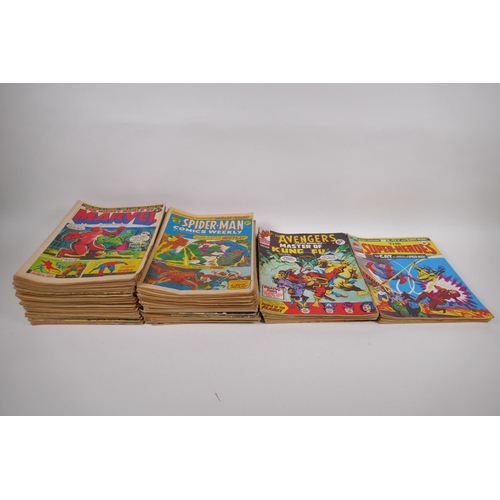 44 - A large quantity of 1970s UK printings of Marvel Comics, including 48 issues of The Mighty World of ... 