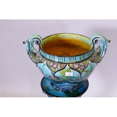 5 - A George Jones & Sons majolica 'orient ware' two handled jardiniere on stand, in vibrant blue gl... 