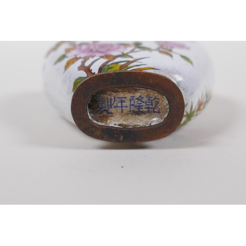 53 - A Chinese canton enamelled copper snuff bottle decorated with asiatic birds and flowers, 4 character... 