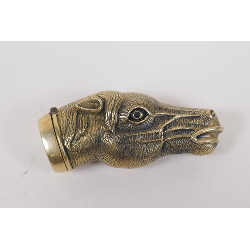 61 - A brass vesta case in the form of a horse's head, 6cm long