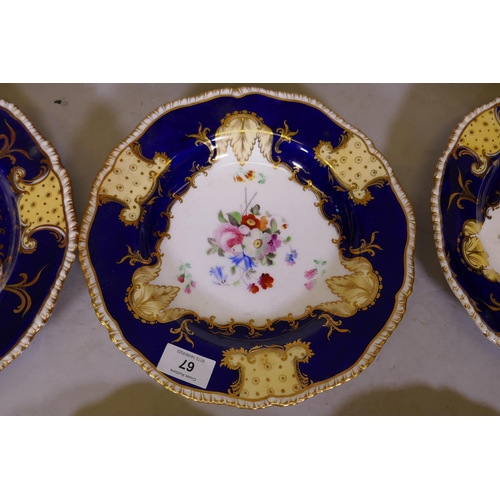 67 - A C19th Staffordshire part dinner service, decorated with hand painted floral sprays and gilt highli... 