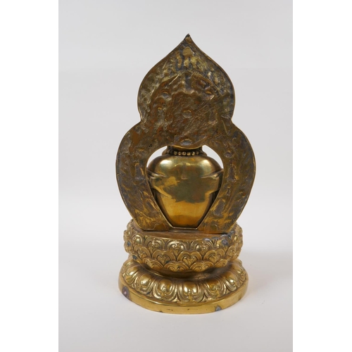 70 - A Chinese brass figure of Buddha seated on a lotus flower, impressed 4 character mark to base, 30cm ... 