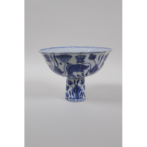 73 - A blue and white porcelain stem bowl with lobed rim and carp decoration, Chinese Xuande 6 character ... 