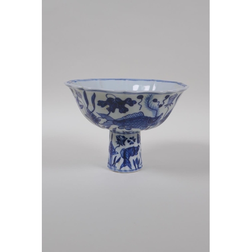 73 - A blue and white porcelain stem bowl with lobed rim and carp decoration, Chinese Xuande 6 character ... 