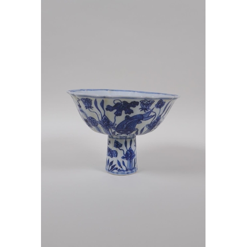 73 - A blue and white porcelain stem bowl with lobed rim and carp decoration, Chinese Xuande 6 character ... 