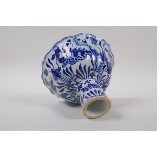 73 - A blue and white porcelain stem bowl with lobed rim and carp decoration, Chinese Xuande 6 character ... 