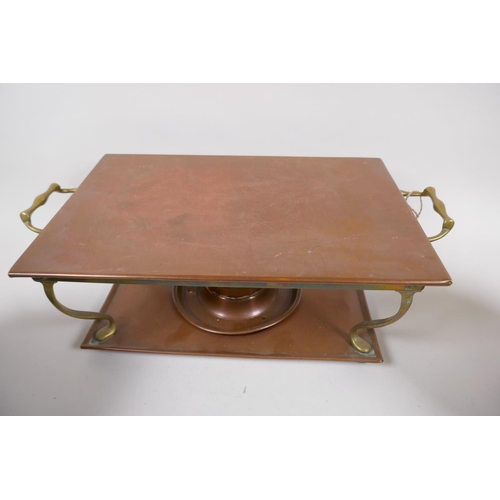 8 - A vintage brass and copper warming stand, 42cm wide, and two C19th copper and brass kettles