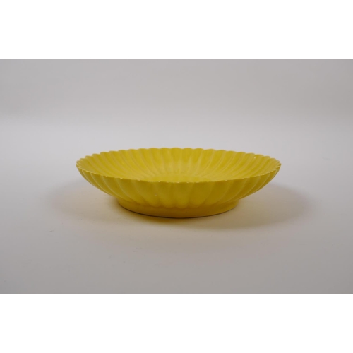 80 - A yellow ground porcelain petal shaped dish, Chinese Yongzheng seal mark to base, 19cm diameter