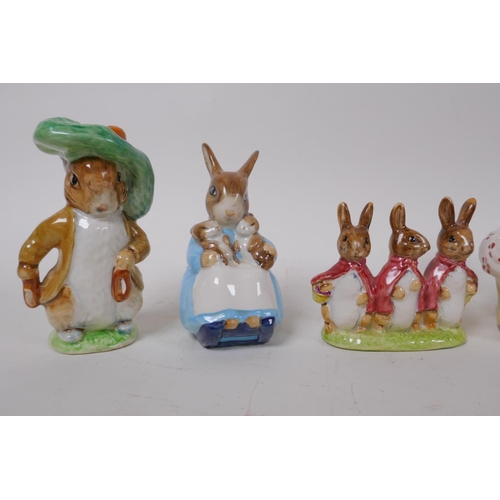 84 - A set of nine Beswick Beatrix Potter porcelain figures, largest 10cm high