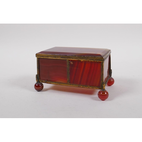 94 - A C19th German banded agate and ormolu trinket box, 13cm x 9cm, 7cm high