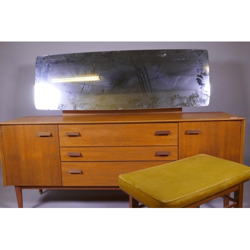 1158 - A mid century E Gomme, G Plan teak dressing table with two cupboards flanking three drawers, 162 x 4... 