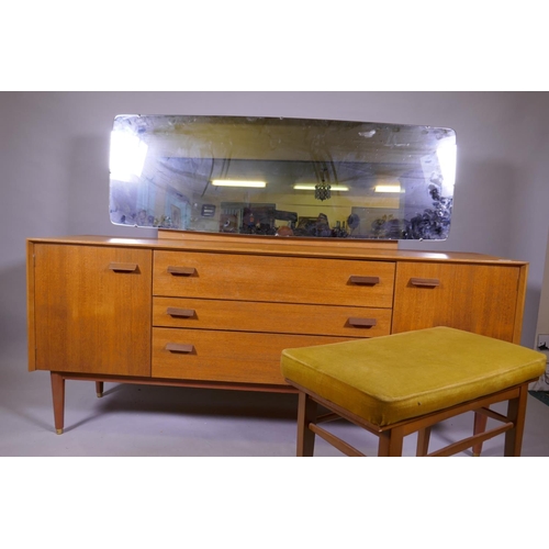 1158 - A mid century E Gomme, G Plan teak dressing table with two cupboards flanking three drawers, 162 x 4... 