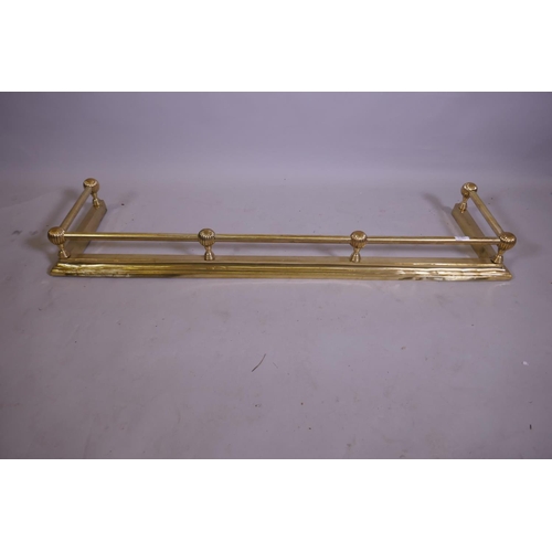 1161 - A Victorian brass fender, external 132 x 35cm