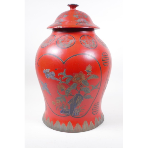 14 - A Chinese lacquered jar and cover decorated with birds amongst flowering trees, and symbols, 41cm hi... 