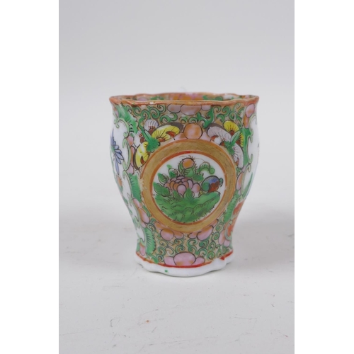 15 - A canton enamelled porcelain beaker with figural and floral decoration, 7cm high