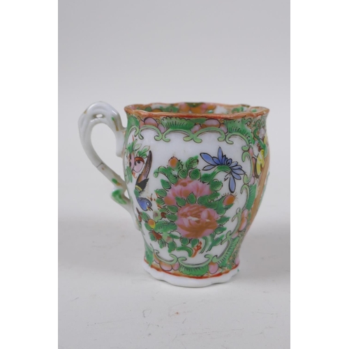 15 - A canton enamelled porcelain beaker with figural and floral decoration, 7cm high