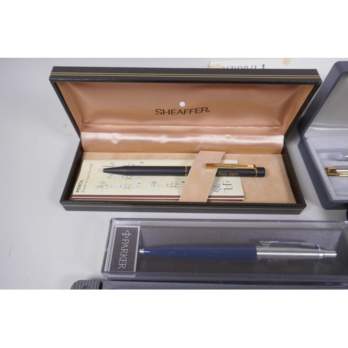 17 - A collection of pens, Parker Laque, Duofold with 14ct gold nib, gold plated fountain pen and propell... 