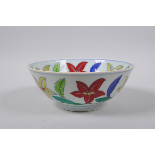 23 - A polychrome porcelain bowl with scrolling floral decoration, Chinese Chenghua 6 character mark to b... 