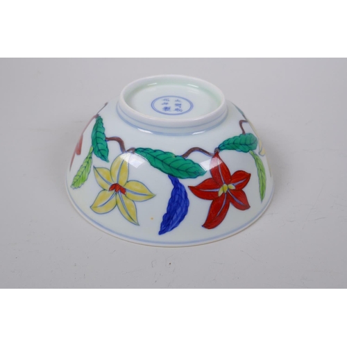 23 - A polychrome porcelain bowl with scrolling floral decoration, Chinese Chenghua 6 character mark to b... 