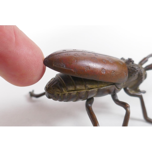 25 - A Japanese Jizai style brone okimono beetle with articulated legs and antennae, 15cm long