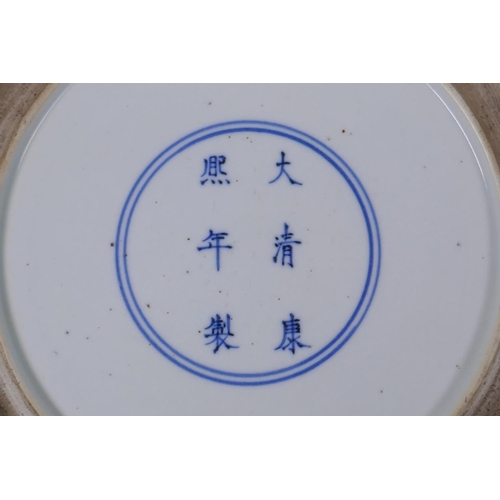 28 - A famille vert porcelain charger decorated with a Kingfisher amongst lotus flowers, Chinese KangXi 6... 