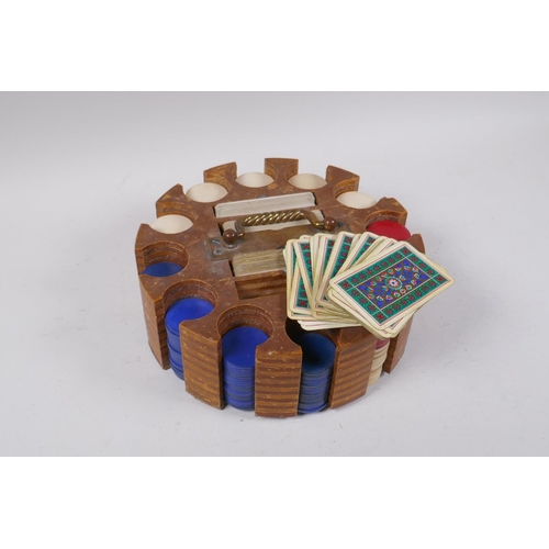 29 - A vintage wooden gaming chip and card caddy, 24cm diameter