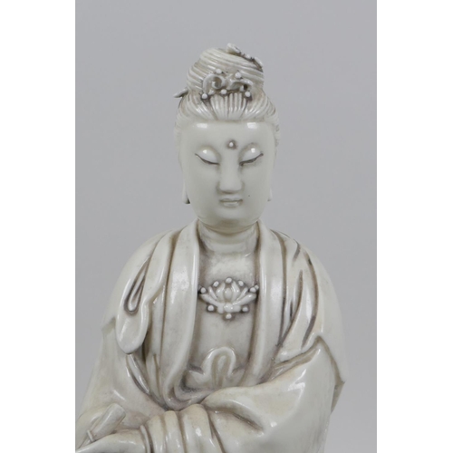 30 - A Chinese blanc de chine figure of Quan Yin, impressed marks verso, 31cm high