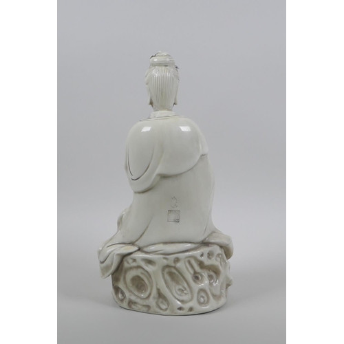 30 - A Chinese blanc de chine figure of Quan Yin, impressed marks verso, 31cm high