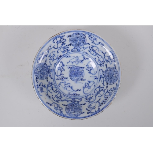 33 - A C19th blue and white porcelain footed dish with bat and auspicious symbol decoration, Chinese Guan... 