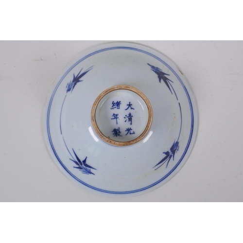 33 - A C19th blue and white porcelain footed dish with bat and auspicious symbol decoration, Chinese Guan... 