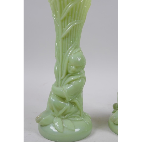 41 - A pair of early C20th Art Nouveau milk glass spill vases in the form of a figure carrying bamboo, 20... 