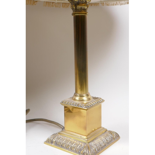 42 - An oriental Japanned metal table lamp, 70cm high, and a brass Corinthian column table lamp