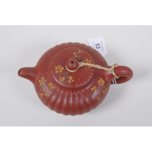 53 - A Chinese YiXing teapot with enamelled prunus decoration, impressed mark to base, 11cm diameter