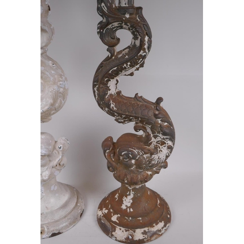 6 - A pair of cast iron lamp bases in the form of classical dolphins, 70cm high