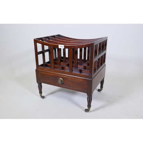 1143 - A Georgian mahogany canterbury with single drawer, ring turned supports and brass castors, 45 x 35cm... 